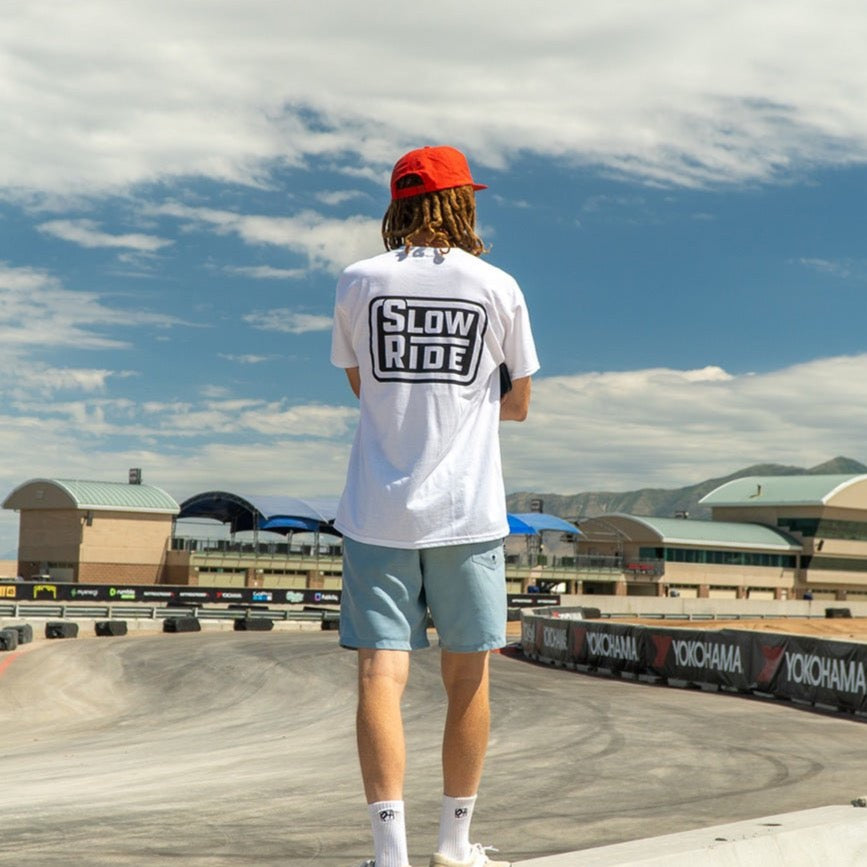 Radio Stacked Tee (White) - Slow Ride Classic black and white Slow Ride t-shirts featuring the bold 'Slow Ride' logo on both the front and back. Ideal for Off-Roading and Off-Road Racing enthusiasts, these slow ride shirts celebrate the vintage Volkswagen culture, including the Volkswagen bus, Volkswagen bug, and Baja bug. Perfect for those who live the Garage and Racing lifestyle and embrace mottos like 'Enjoy Getting There,' 'Wheelin and Spilling,' and 'Restore and Destroy.' A must-have for blue-collar wo