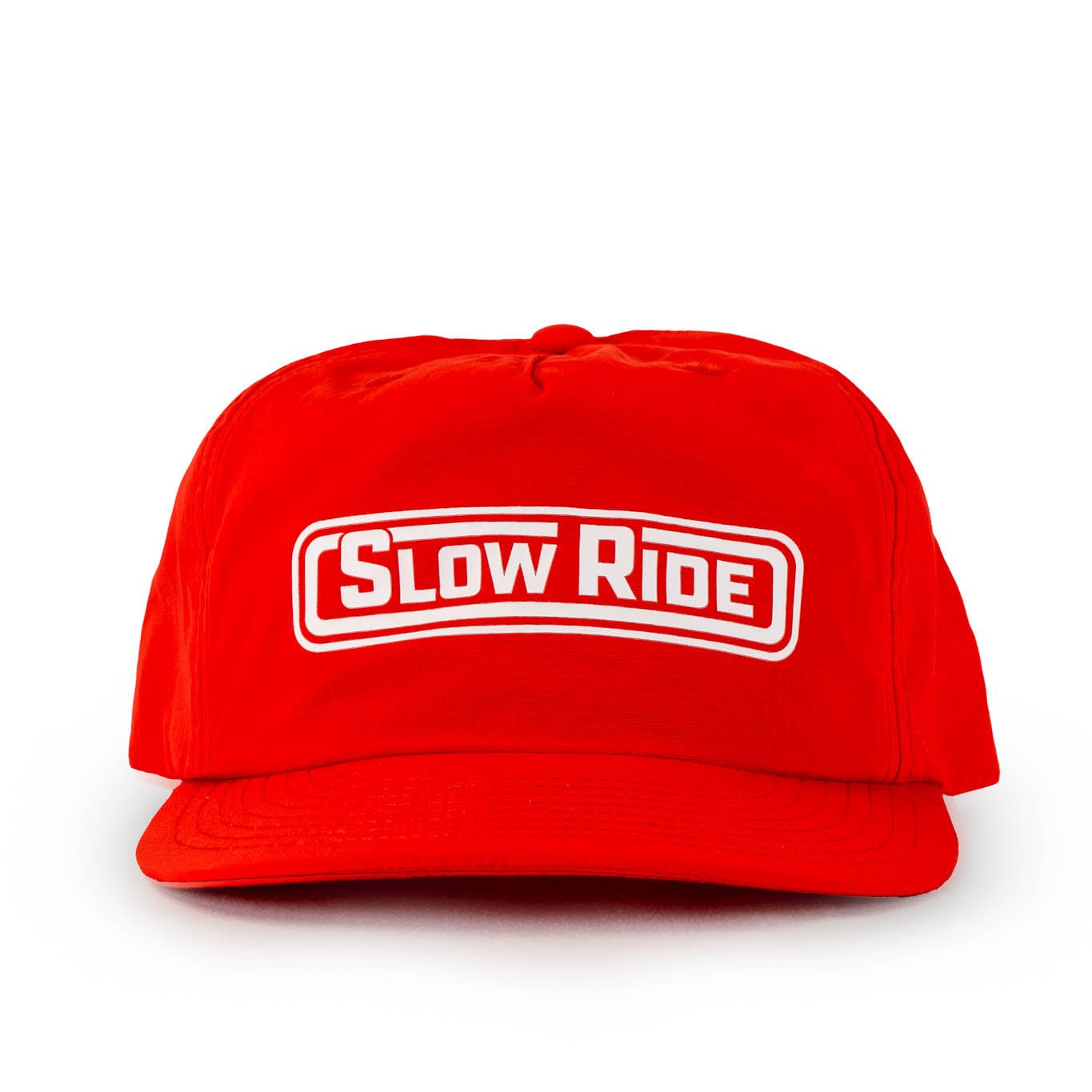 Radio Surf Hat (4 Colors) - Slow Ride- Slow Ride nylon surf hat in vibrant colors, perfect for off-roading adventures and beach days. Features bold 'Slow Ride' logo, ideal for Volkswagen bus enthusiasts and vintage Volkswagen fans. Great for off-road racing, Baja bug lovers, and those who embrace the Garage and Racing lifestyle. Embody the spirit of 'Enjoy Getting There' with this blue-collar, workwear-inspired accessory. Whether you're wheelin’ and spilling or restoring and destroying, this hat is your go 